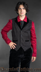 Men’s black brocade gothic vest with black velvet lapel, worn over a red patterned shirt, Victorian alternative fashion