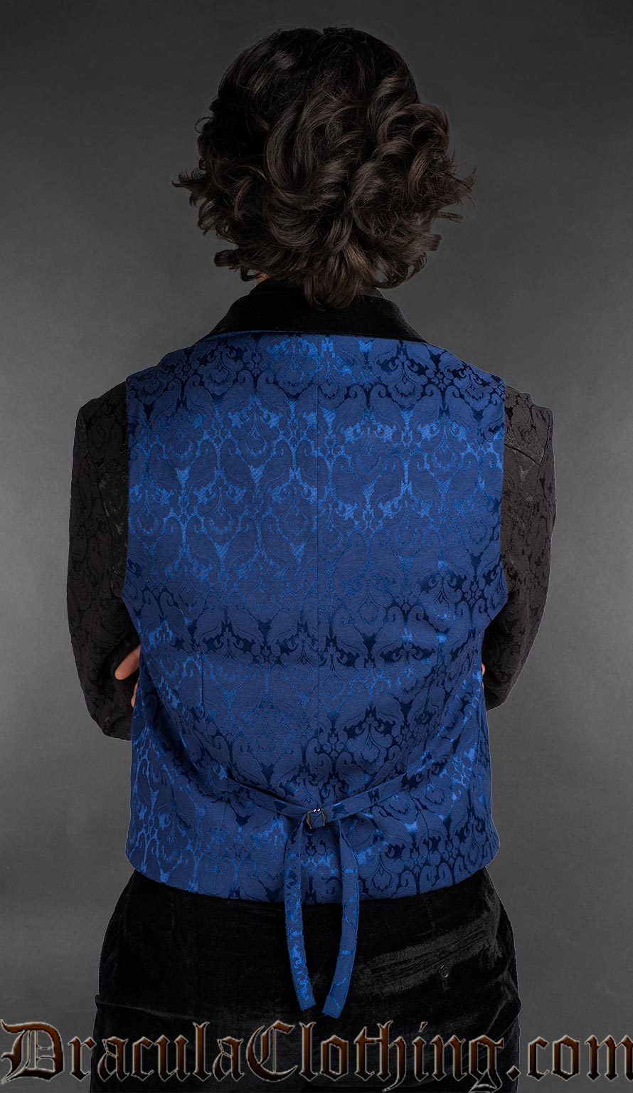 Back view of Blue brocade gothic waistcoat with black shawl lapel, Victorian-inspired men’s alternative fashion