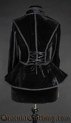 Back view of black velvet military jacket for women showing adjustable corset style lacing in the back and skirt hem