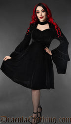 Long sleeved black velvet women's knee length dress with trumpet sleeves and queen anne style neckline and added high neck collar