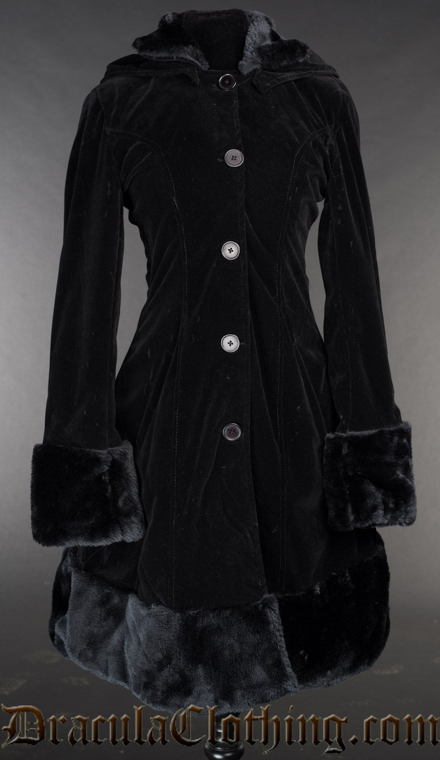 Women's button down thick black velvet coat with faux fur on the cuffs, collar and hem