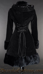 Back view of women's black velvet coat shown without the attachable cape and adjustable corset style lacing in torso