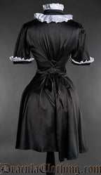 Back view of Victorian gothic black satin dress with white ruffled collar and short sleeves on mannequin