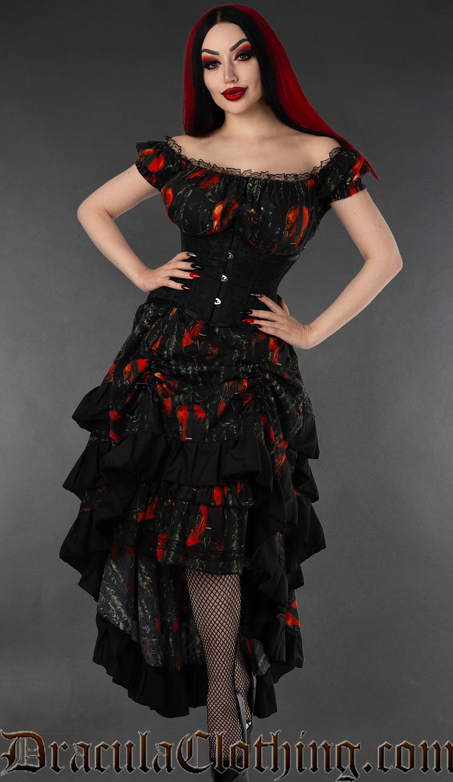 Women's layered bustle skirt in black colour with print of violins worn by model with front raised