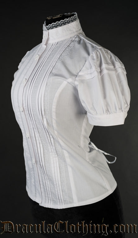 Side view of white edwardian blouse showing short puffed sleeves and pleated design in the front